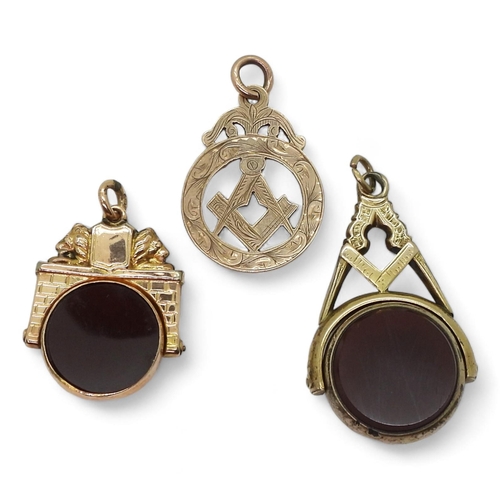 705 - A large 9ct gold Masonic swivel fob seal set with bloodstone and carnelian, a further 9ct Masonic me... 