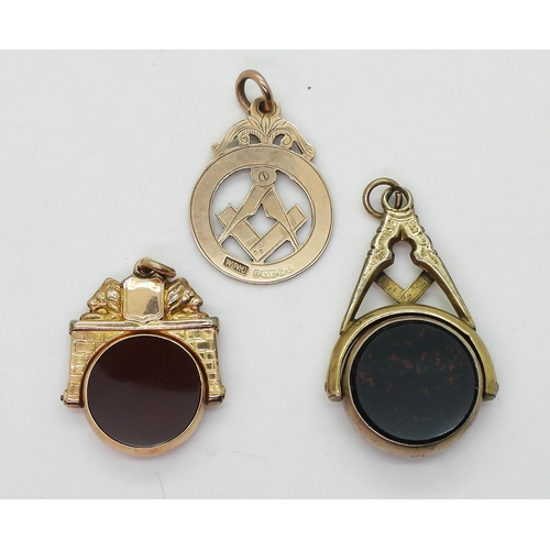 705 - A large 9ct gold Masonic swivel fob seal set with bloodstone and carnelian, a further 9ct Masonic me... 