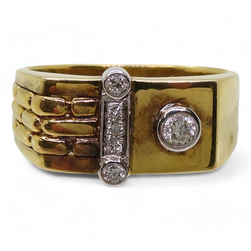 718 - A bright yellow metal ring stamped 750, set with diamonds with an estimated approx combined diamond ... 