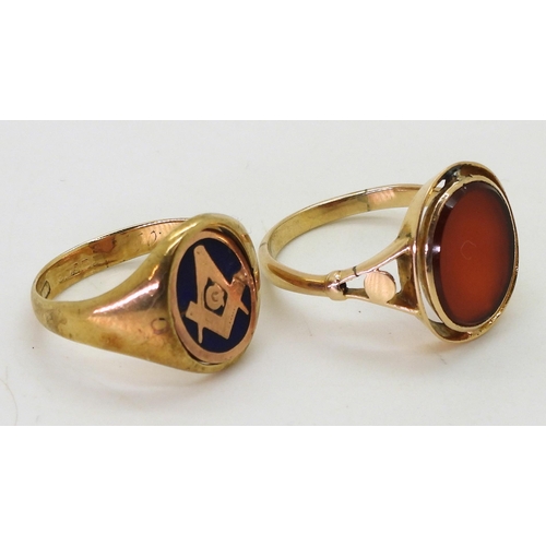 719 - A 9ct gold Masonic swivel signet ring, size Q,with a yellow metal signet ring set with carnelian, si... 