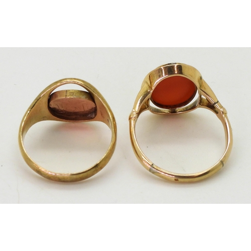 719 - A 9ct gold Masonic swivel signet ring, size Q,with a yellow metal signet ring set with carnelian, si... 