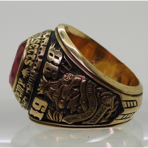 722 - A yellow metal American College ring, stamped 10K, for the Massachusetts Maritime Academy 1998, size... 