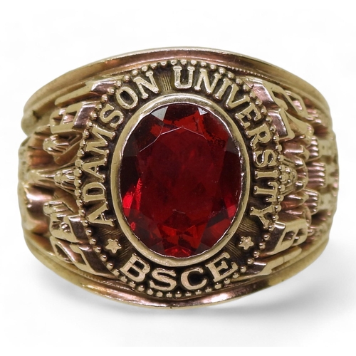 729 - A Suarez brand American college ring, for Adamson University BSCE, 1972, made in yellow metal and se... 