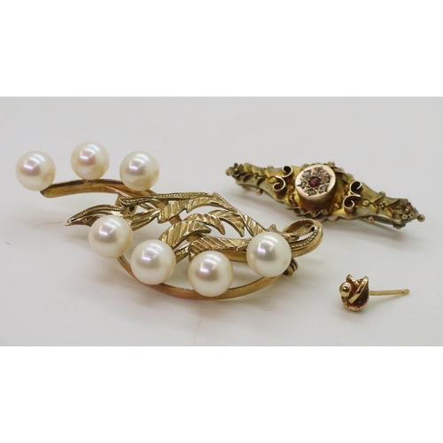 740 - A 9ct gold pearl brooch, length 5.8cm, a further 9ct gold rose cut diamond and red gem brooch, lengt... 