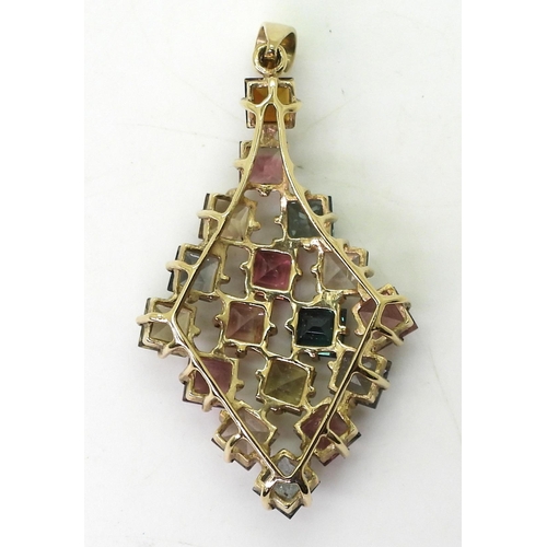 751 - A multi gem set abstract pendant (probably tourmalines) length of pendant 5.4cm, weight 8.8gms