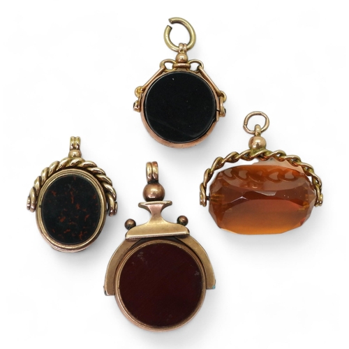 752 - Four vintage fob seals, 9ct gold mounted orange glass, largest bloodstone /carnelian seal, stamped 1... 