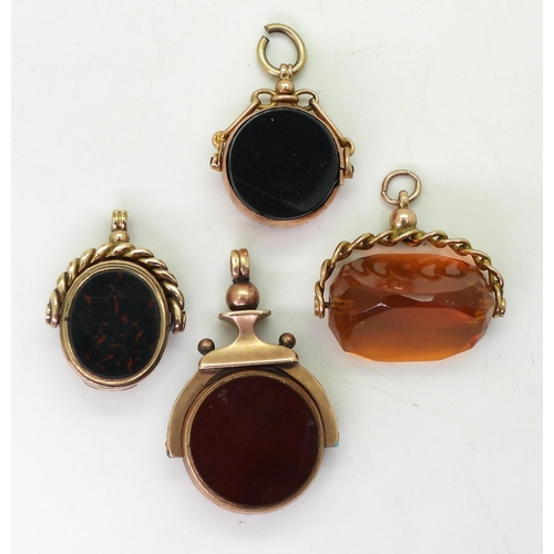 752 - Four vintage fob seals, 9ct gold mounted orange glass, largest bloodstone /carnelian seal, stamped 1... 