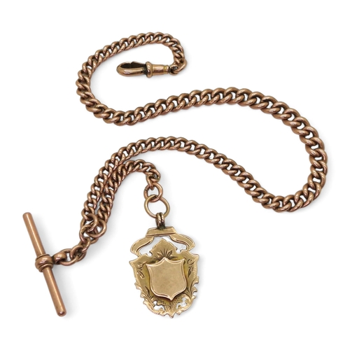 755 - A 9ct rose gold tapered fob chain, with a 9ct gold medallion, length of chain 30cm from clasp to 'T'... 