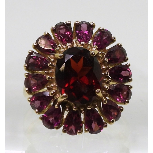 759 - A 9ct gold GemsTV garnet cluster ring, size N1/2, weight 5.5gms