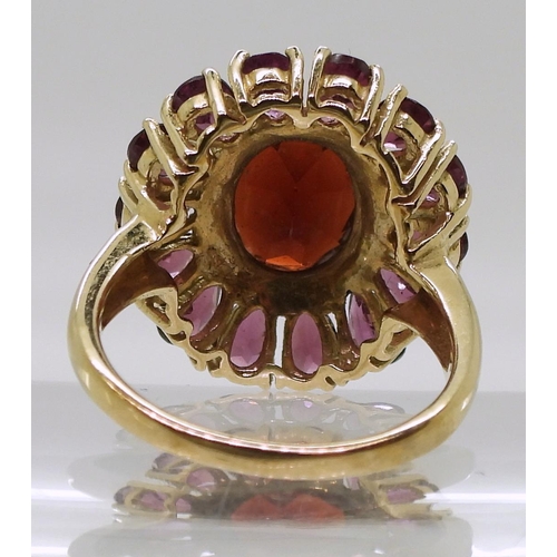 759 - A 9ct gold GemsTV garnet cluster ring, size N1/2, weight 5.5gms