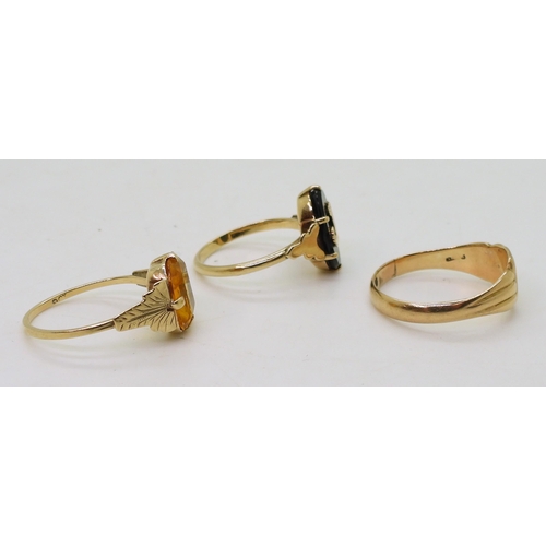 767 - Three 9ct gold rings, signet size Q, onyx signet size L1/2, and orange glass size M, weight together... 