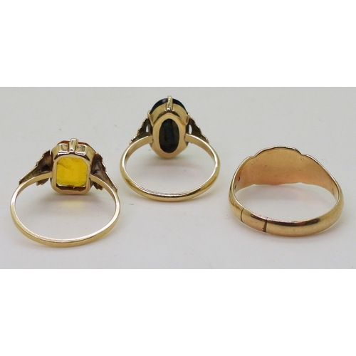 767 - Three 9ct gold rings, signet size Q, onyx signet size L1/2, and orange glass size M, weight together... 