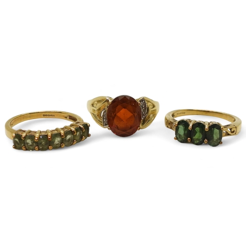 768 - A 9ct gold GemsTV, dark orange citrine and diamond ring, size N1/2, together with a three stone gree... 