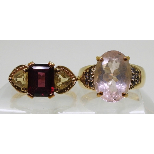 774 - A 9ct gold garnet and citrine three stone ring, size N1/2, together with a rose quartz and purple ge... 