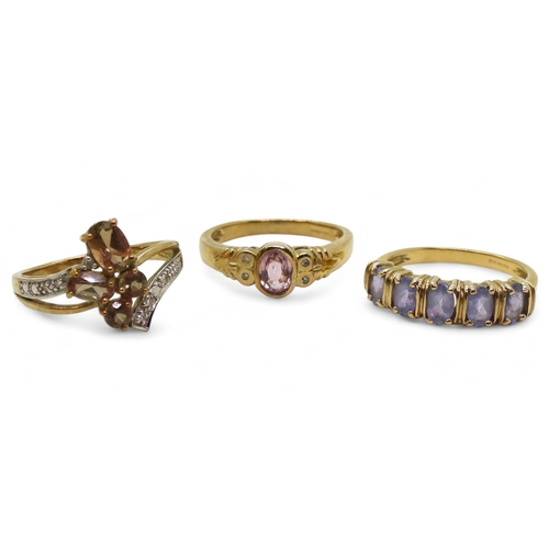 780 - A 9ct gold andalusite and diamond accent cluster ring, size N1/2, a 9ct pink sapphire and diamond ri... 