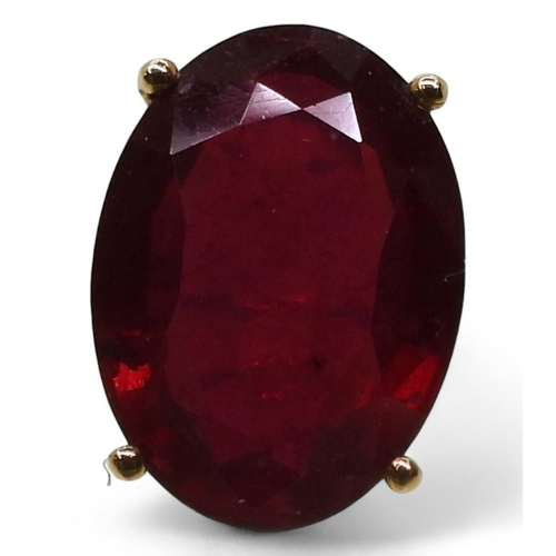 782 - A large 9ct gold glass bonded ruby ring, ruby approx 17.8mm x 13mm x 7.1mm,  size Q, weight 5.8... 