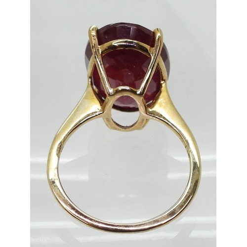 782 - A large 9ct gold glass bonded ruby ring, ruby approx 17.8mm x 13mm x 7.1mm,  size Q, weight 5.8... 