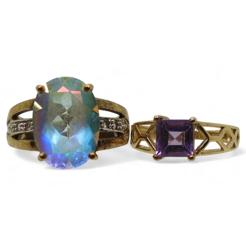 785 - A 9ct gold mermaid topaz ring, size O, together with a 9ct gold amethyst ring, size N, weight 9.2gms