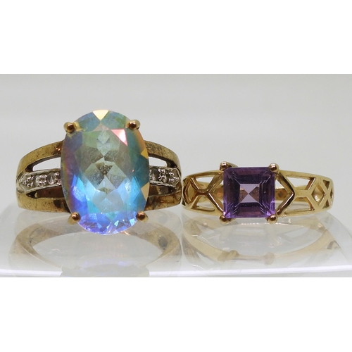 785 - A 9ct gold mermaid topaz ring, size O, together with a 9ct gold amethyst ring, size N, weight 9.2gms