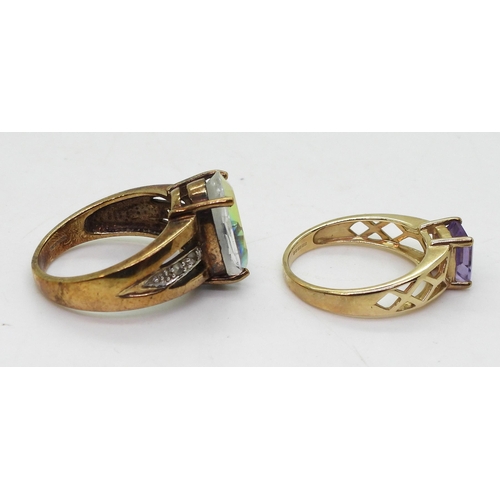 785 - A 9ct gold mermaid topaz ring, size O, together with a 9ct gold amethyst ring, size N, weight 9.2gms