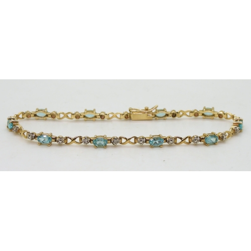 797 - A 9ct gold apatite and diamond accent bracelet, length 19cm, weight 6.4gms