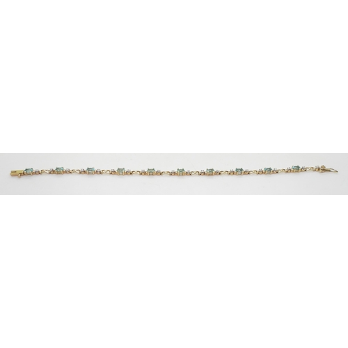 797 - A 9ct gold apatite and diamond accent bracelet, length 19cm, weight 6.4gms