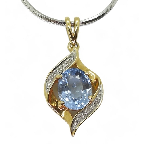 799 - An 18ct gold paraiba tourmaline and diamond pendant, with an 18ct white gold 45cm diamond cut snake ... 