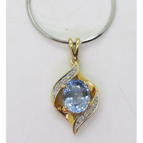 799 - An 18ct gold paraiba tourmaline and diamond pendant, with an 18ct white gold 45cm diamond cut snake ... 