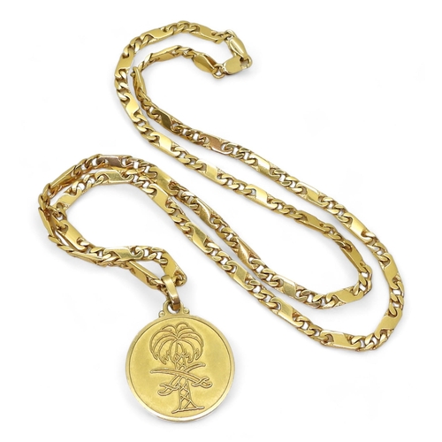 805 - An 18k gold Italian made pendant of the emblem of Saudi Arabia together with a 60cm 18ct gold fancy ... 