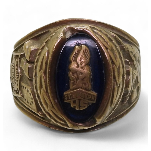 814 - A 10k gold Jostens brand American college ring for St. Joseph's High School, 1977, size U1/2, weight... 