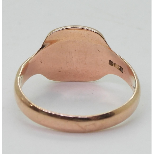 818 - A 9ct rose gold signet ring, size P1/2, weight 3.5gms