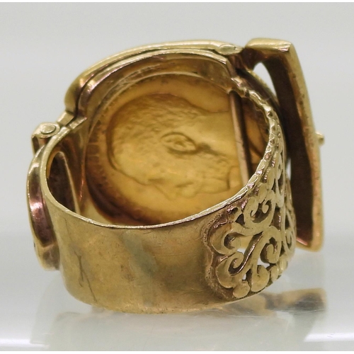 820 - A 1914 gold half sovereign in an unusual 9ct gold filigree buckle design ring mount, size Q1/2, weig... 