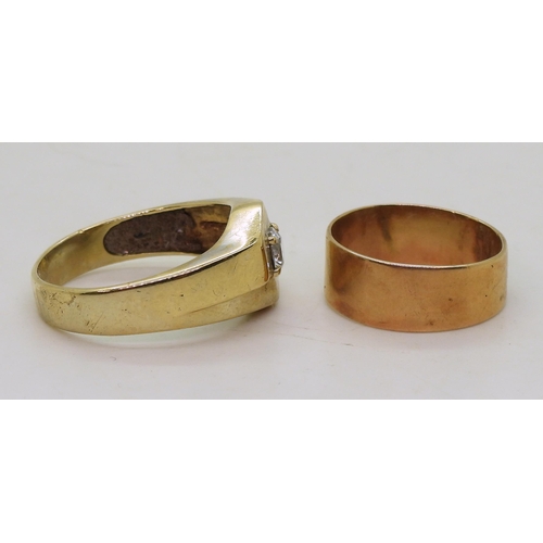 827 - A 9ct gold ring set with a clear gem, size V, and a yellow metal wedding ring, weight together 7.6gm... 