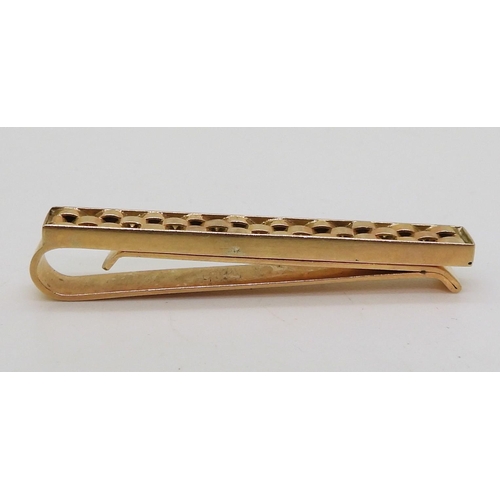 839 - A yellow metal tie slide with basket weave design, stamped 14k, length 4.5cm, weight 10.1gms