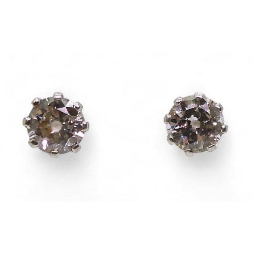 841 - A pair of 14k gold diamond stud earrings, set with estimated approx 0.30cts across the pair, weight ... 