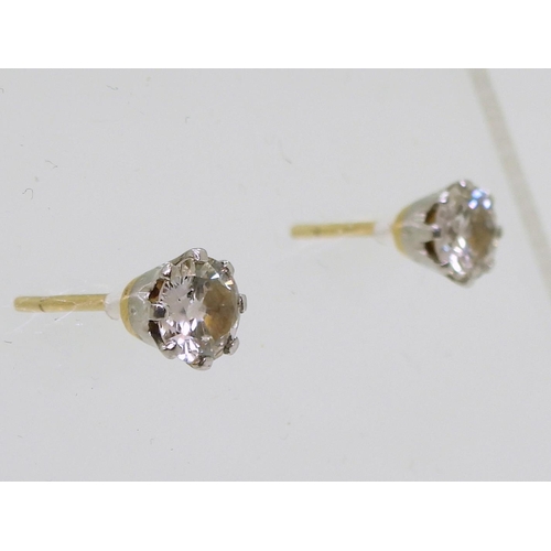 841 - A pair of 14k gold diamond stud earrings, set with estimated approx 0.30cts across the pair, weight ... 