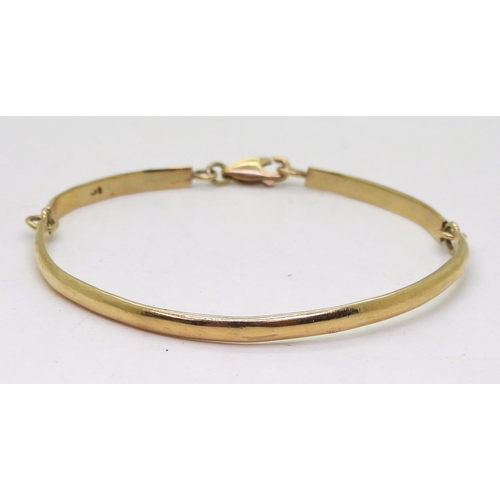 842 - A 9ct gold articulated bangle, weight 10gms