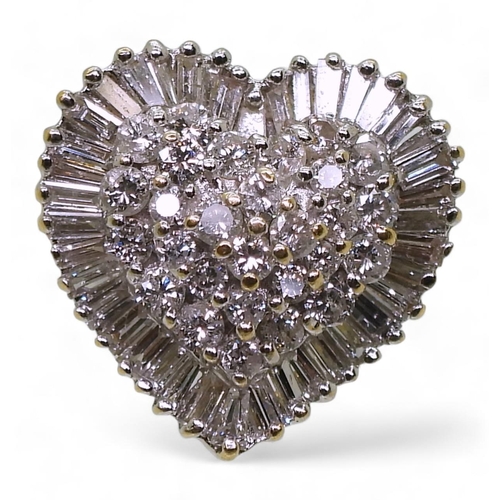 848 - An 18ct gold heart shaped diamond cluster set with estimated approx 2cts of baguette and brilliant c... 