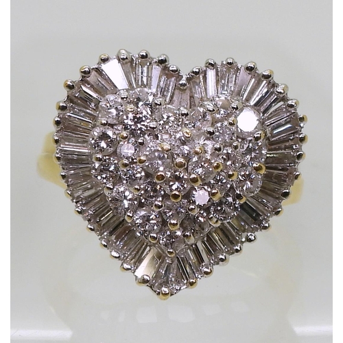 848 - An 18ct gold heart shaped diamond cluster set with estimated approx 2cts of baguette and brilliant c... 