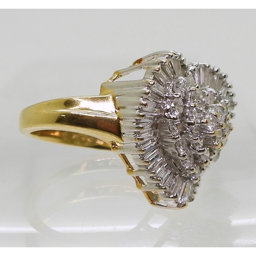 848 - An 18ct gold heart shaped diamond cluster set with estimated approx 2cts of baguette and brilliant c... 