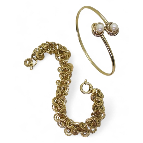 851 - A 9ct gold twin pearl bangle, together with a 9ct gold multi link bracelet, weight together 15.4gms