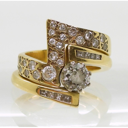 856 - A pair of bright yellow metal and diamond matching zig zag pattern rings, a solitaire of estimated 0... 