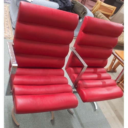 103 - A pair of 20th century red vinyl and chrome armchairs, 113cm high x 69cm wide x 57cm deep