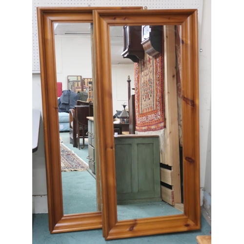 45 - A pair of contemporary pine framed wall mirrors, 137cm x 62cm (2)