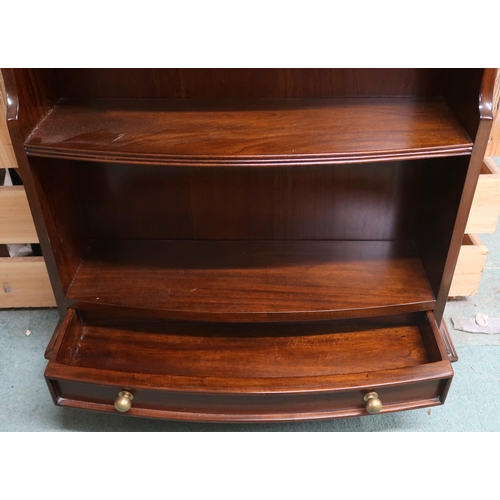 48 - A 20th century mahogany bow front waterfall bookcase with three open shelves over single drawer on b... 