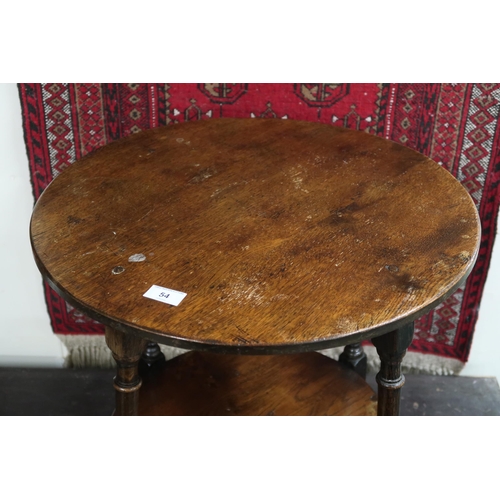 54 - A 20th century oak G.T. Rackstraw, Worcester circular topped two tier occasional table with turned s... 