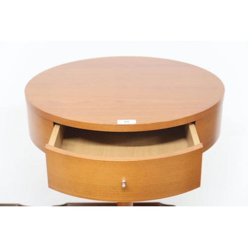 65 - A contemporary cherry wood Calligaris single drawer lamp table on circular base with tapering cylind... 