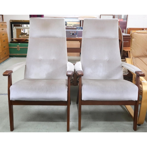 70 - A pair of mid 20th century stained teak framed Parker Knoll model PK 1071-74 armchairs with green ve... 