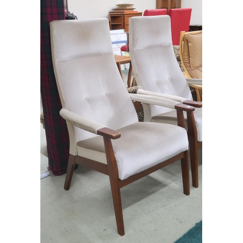 70 - A pair of mid 20th century stained teak framed Parker Knoll model PK 1071-74 armchairs with green ve... 