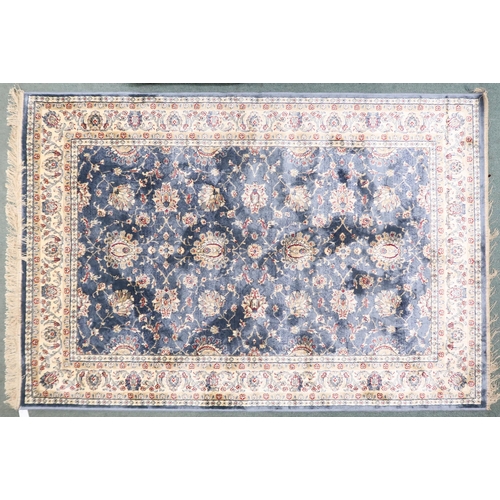 73 - A duck egg blue full pile kashmir Zeigler rug with all over floral patterned design within ivory flo... 